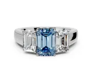 3 Stone Engagement Ring Setting for Fancy Blue Emerald Cut Center with Raised Basket Heads and Prong Head in Platinum