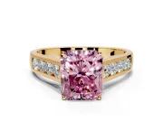 Solitaire Engagement Ring Setting for Fancy Pink Radiant Cut Center with Round Cut Channel Band and Prong Head in Yellow Gold
