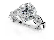 Solitaire Engagement Ring Setting for Round Cut Center with Accented Twist Band and Leaf Prong Head in Platinum