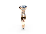 3 Stone Engagement Ring Setting for Fancy Blue Heart-Shaped Center with Pave Split Shank and Prong Head in Rose Gold