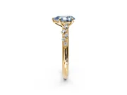 Cluster Engagement Ring Setting for Fancy Blue Pear-Shaped Center with Round Cut Accent Band and Prong Head in Yellow Gold