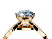 Solitaire Engagement Ring Setting for Fancy Blue Oval Center with Accented Twist Band and Leaf Prong Head in Yellow Gold