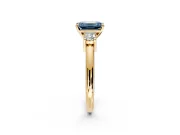 3 Stone Engagement Ring Setting for Fancy Blue Emerald Cut Center with Wide Plain Band and Prong Head in Yellow Gold