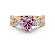 3 Stone Engagement Ring Setting for Fancy Pink Heart-Shaped Center with Pave Twist Band and Prong Head in Rose Gold