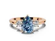 3 Stone Engagement Ring Setting for Fancy Blue Pear-Shaped Center with Wide Plain Band and Prong Head in Rose Gold
