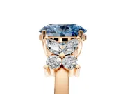 Floral Engagement Ring Setting for Fancy Blue Oval Center with Marquise Cluster Shoulders and Prong Head in Rose Gold