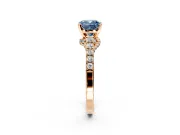 Solitaire Engagement Ring Setting for Fancy Blue Cushion Cut Center with Crossover Accents and Prong Head in Rose Gold