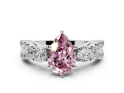 3 Stone Engagement Ring Setting for Fancy Pink Pear-Shaped Center with Pave Split Shank and Prong Head in Platinum