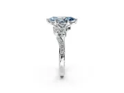 Solitaire Engagement Ring Setting for Fancy Blue Marquise Center with Marquise Accent Twist Band and Prong Head in Platinum