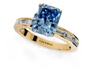 Solitaire Engagement Ring Setting for Fancy Blue Radiant Cut Center with Channel Baguette Band and Prong Head in Yellow Gold