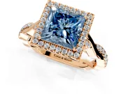 Halo Engagement Ring Setting for Fancy Blue Princess Cut Center with Twist Band and Prong Head in Rose Gold