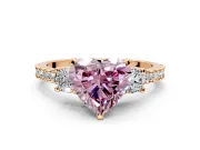 3 Stone Engagement Ring Setting for Fancy Pink Heart-Shaped Center with Round Cut Side Accents and Prong Head in Rose Gold