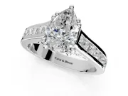 Solitaire Engagement Ring Setting for Pear-Shaped Center with Channel Band and Double Claw Prong Head in Sterling Silver