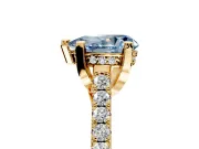 Solitaire Engagement Ring Setting for Fancy Blue Pear-Shaped Center with Widening Pave Band and Claw Prong Head in Yellow Gold