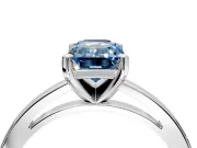 Solitaire Engagement Ring Setting for Fancy Blue Emerald Cut Center with Basket Rail and Prong Head in White Gold