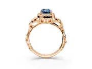 Halo Engagement Ring Setting for Fancy Blue Emerald Cut Center with Open Scroll Shoulders and Prong Head in Rose Gold