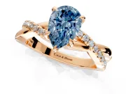 Crossover Engagement Ring Setting for Fancy Blue Pear-Shaped Center with Pave and Plain Strands and Prong Head in Rose Gold