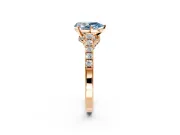 Solitaire Engagement Ring Setting for Fancy Blue Pear-Shaped Center with Crossover Accents and Prong Head in Rose Gold
