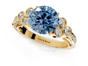 Cluster Engagement Ring Setting for Fancy Blue Round Cut Center with Bezel Accent Clusters and Prong Head in Yellow Gold