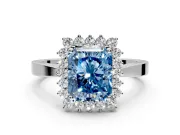 Starburst Halo Engagement Ring Setting for Fancy Blue Radiant Cut Center with Flat Cathedral Band and Prong Head in Platinum