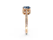 Cathedral Engagement Ring Setting for Fancy Blue Round Cut Center with Antique-Style Pave Band and Prong Head in Rose Gold