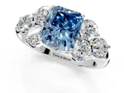 Cluster Engagement Ring Setting for Fancy Blue Radiant Cut Center with Round Cut Accent Frame and Prong Head in Platinum