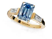 3 Stone Engagement Ring Setting for Fancy Blue Emerald Cut Center with Baguette Accents and Prong Head in Yellow Gold