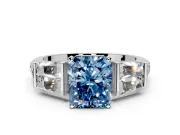 Channel-Set Engagement Ring Setting for Fancy Blue Radiant Cut Center with Baguette Band and Prong Head in Platinum