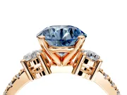 3 Stone Engagement Ring Setting for Fancy Blue Round Cut Center with Round Cut Side Accents and Prong Head in Rose Gold