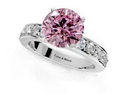 Solitaire Engagement Ring Setting for Fancy Pink Round Cut Center with Channel-Set Accents and Prong Head in White Gold