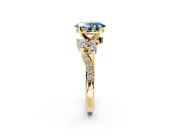 Solitaire Engagement Ring Setting for Fancy Blue Oval Center with Marquise Accent Twist Band and Prong Head in Yellow Gold
