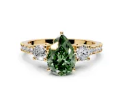 3 Stone Engagement Ring Setting for Fancy Green Pear-Shaped Center with Round Cut Side Accents and Prong Head in Yellow Gold