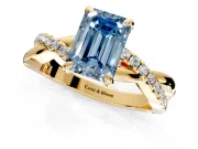 Solitaire Engagement Ring Setting for Fancy Blue Emerald Cut Center with Half-Pave Crossover Band and Prong Head in Yellow Gold