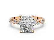Solitaire Engagement Ring Setting for Radiant Cut Center with Trailing Leaf Accent Band and Prong Head in Rose Gold