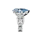 3 Stone Engagement Ring Setting for Fancy Blue Pear-Shaped Center with Round Cut Side Accents and Prong Head in Sterling Silver