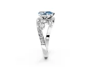 Solitaire Engagement Ring Setting for Fancy Blue Pear-Shaped Center with Pave Bypass Twist Band and Prong Head in Sterling Silver