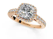 Halo Engagement Ring Setting for Cushion Cut Center with Full Pave Band and Prong Head in Rose Gold