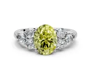 Cluster Engagement Ring Setting for Fancy Yellow Oval Center with Round Cut Accent Frame and Prong Head in Platinum