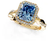Halo Engagement Ring Setting for Fancy Blue Radiant Cut Center with Pave and Plain Twist Band and Prong Head in Yellow Gold