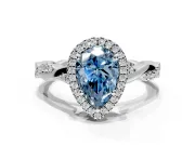 Halo Engagement Ring Setting for Fancy Blue Pear-Shaped Center with Pave and Plain Twist Band and Prong Head in White Gold