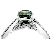 Solitaire Engagement Ring Setting for Fancy Green Emerald Cut Center with Crossover Accents and Prong Head in Sterling Silver