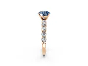 Shared-Prong Engagement Ring Setting for Fancy Blue Round Cut Center with Graduated Accents and Prong Head in Rose Gold