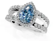 Halo Engagement Ring Setting for Fancy Blue Pear-Shaped Center with Wide-Open Pave Split Shank and Prong Head in Platinum
