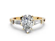 Bar-Set Engagement Ring Setting for Pear-Shaped Center with Tapered Baguette Accents and Prong Head in Yellow Gold