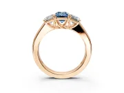 3 Stone Engagement Ring Setting for Fancy Blue Emerald Cut Center with Raised Basket Heads and Prong Head in Rose Gold