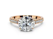 Solitaire Engagement Ring Setting for Round Cut Center with Partway Pave Band and Prong Head in Rose Gold