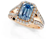 Halo Engagement Ring Setting for Fancy Blue Emerald Cut Center with Narrow Pave Split Shank and Prong Head in Rose Gold