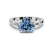 3 Stone Engagement Ring Setting for Fancy Blue Heart-Shaped Center with Baguette Accents and Prong Head in White Gold