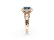 Halo Engagement Ring Setting for Fancy Blue Emerald Cut Center with Two-Strand Split Shank and Prong Head in Rose Gold