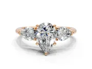 3 Stone Engagement Ring Setting for Pear-Shaped Center with Large Pear-Shaped Accents and Prong Head in Rose Gold
